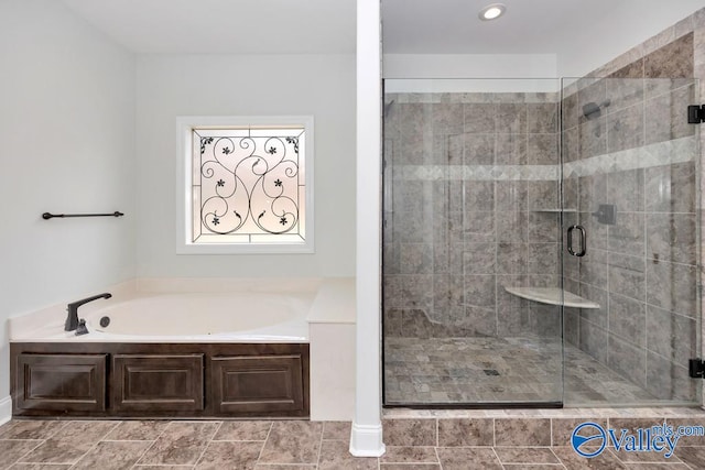 bathroom featuring separate shower and tub and tile patterned flooring