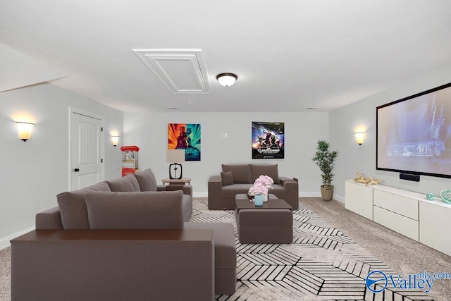 home theater room with light colored carpet