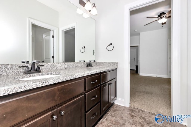 bathroom featuring tile patterned flooring, dual vanity, and ceiling fan