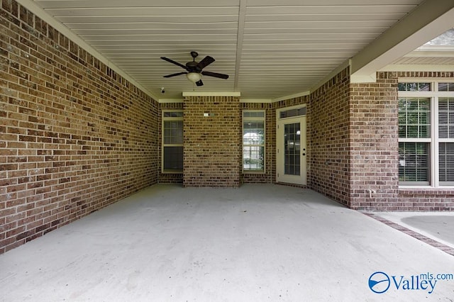 view of patio featuring ceiling fan