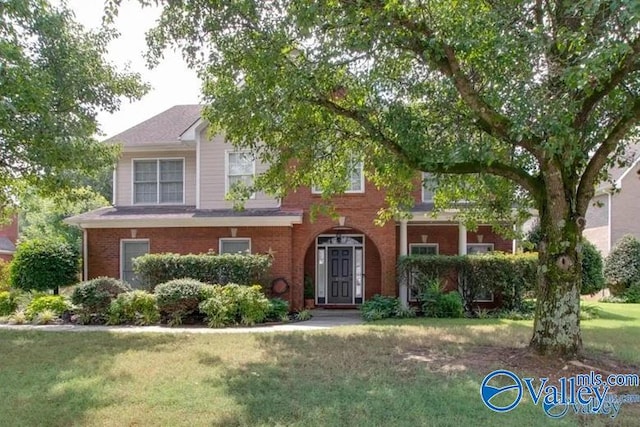 view of front of house with a front lawn