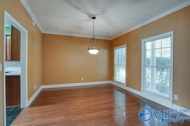 unfurnished dining area featuring wood-type flooring and ornamental molding