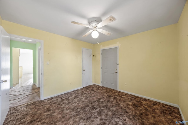 spare room with carpet flooring and ceiling fan