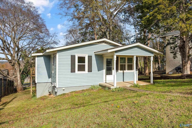 bungalow with a front lawn