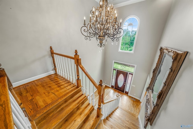 904 Driver Rd NW, Fort Payne, AL 35967 - entryway with a high ceiling, wood finished floors, baseboards, and a chandelier