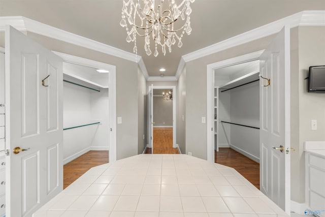 904 Driver Rd NW, Fort Payne, AL 35967 - bedroom with wood finished floors, a closet, crown molding, baseboards, and a chandelier