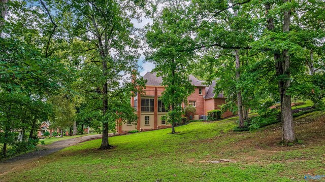 exterior space featuring a front lawn