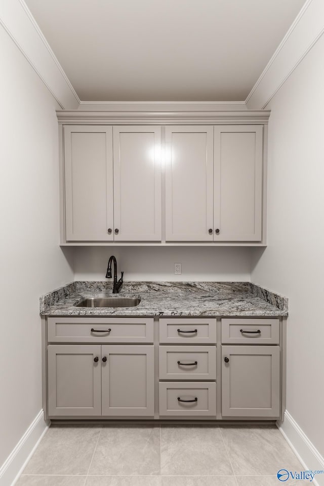 20020 Capitol Hill Dr, Tanner, AL 35671 - bar featuring ornamental molding, a sink, and baseboards