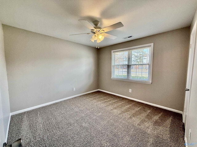 carpeted empty room with ceiling fan