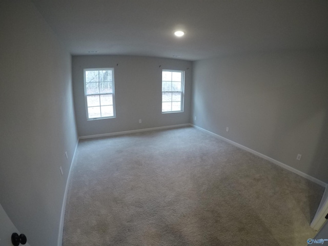 empty room with carpet flooring