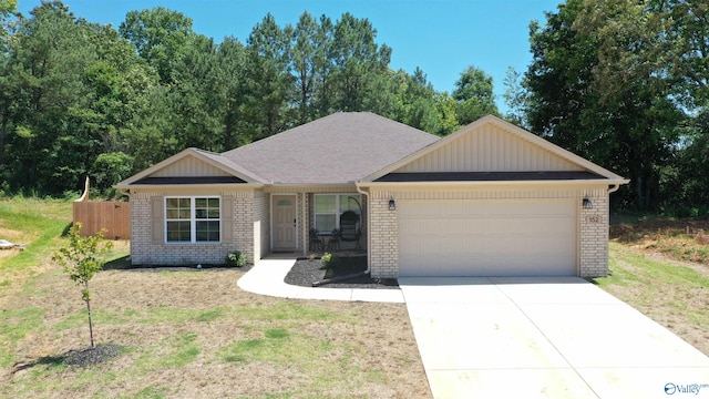 ranch-style house featuring a garage