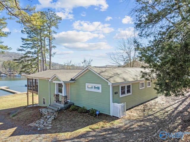 single story home with a water view