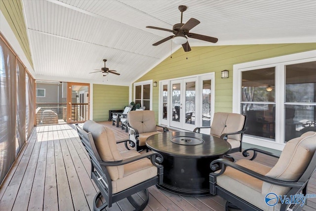 deck featuring ceiling fan and french doors