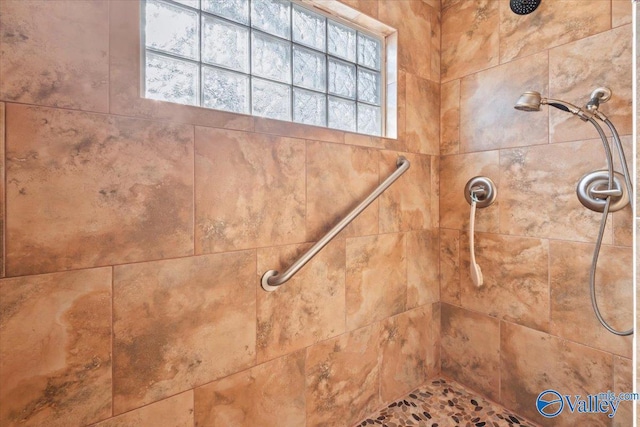 room details with a tile shower