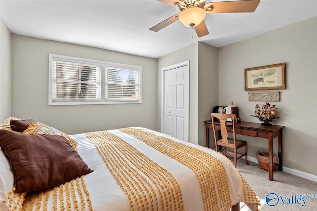 bedroom featuring ceiling fan, a closet, and carpet flooring