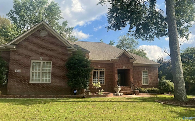 108 Holbrook Dr, Huntsville, AL 35806 - view of front of property with brick siding and a front lawn
