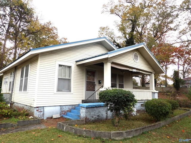 bungalow-style home with a porch