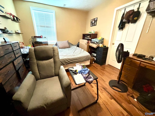 bedroom featuring hardwood / wood-style flooring