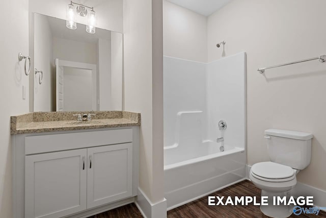 full bathroom featuring shower / tub combination, wood-type flooring, vanity, and toilet