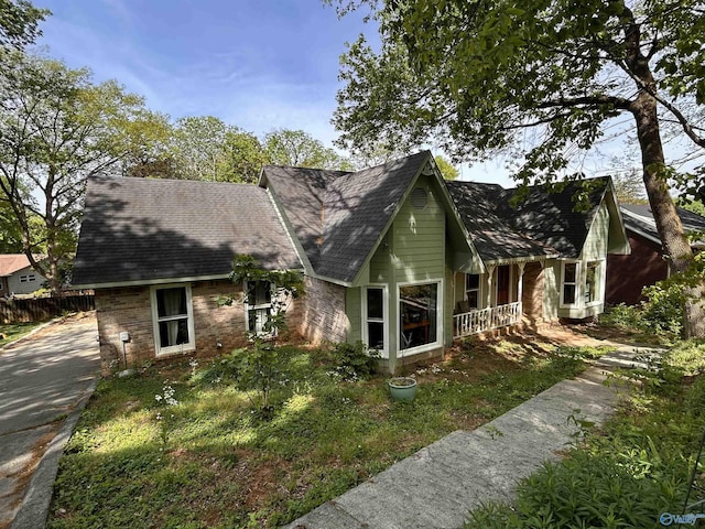 2103 Orba Dr, Huntsville, AL 35811 - view of front of property with covered porch, fence, and roof with shingles