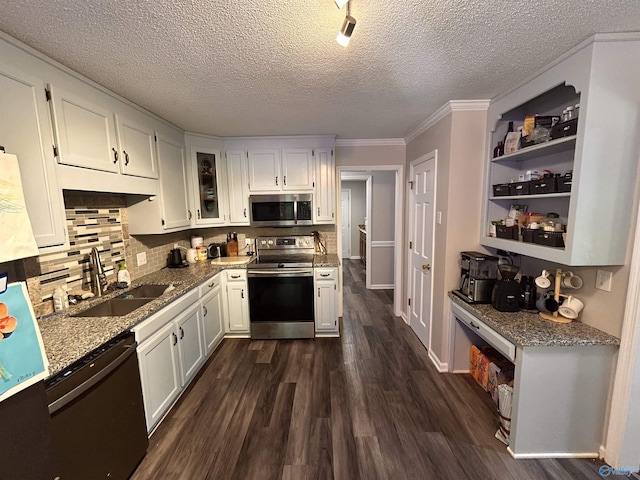 2103 Orba Dr, Huntsville, AL 35811 - kitchen with crown molding, dark wood-style flooring, appliances with stainless steel finishes, a sink, and white cabinetry