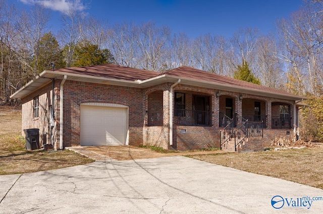 view of front of house with a garage and covered porch