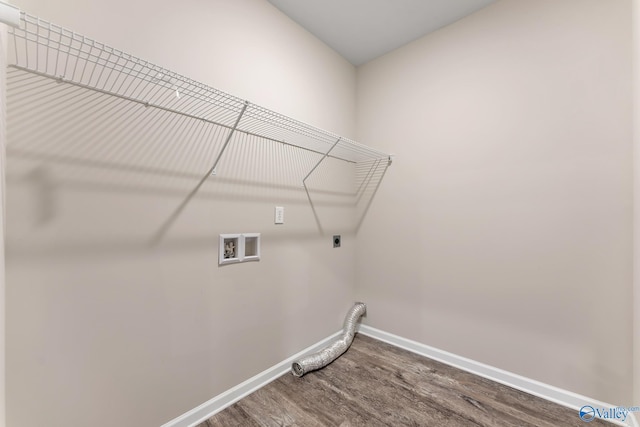 laundry room with electric dryer hookup, washer hookup, wood finished floors, baseboards, and laundry area