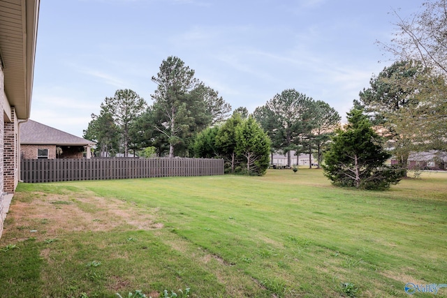 view of yard with fence