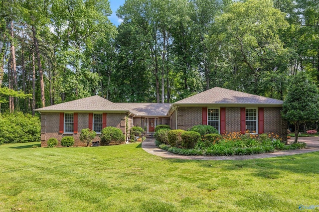 210 Wellington Dr, Athens, AL 35613 - ranch-style house with brick siding, a front yard, and roof with shingles