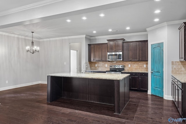 kitchen featuring dark wood-type flooring, stainless steel appliances, and a center island with sink