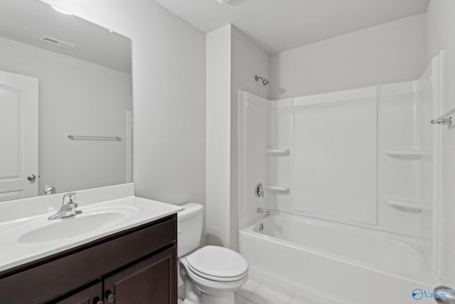 full bathroom featuring shower / washtub combination, tile patterned flooring, vanity, and toilet