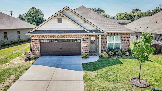 view of front of house featuring brick siding, an attached garage, driveway, and a front yard