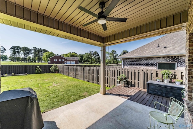 view of patio featuring a fenced backyard, a ceiling fan, and a wooden deck