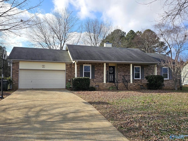 single story home featuring a garage