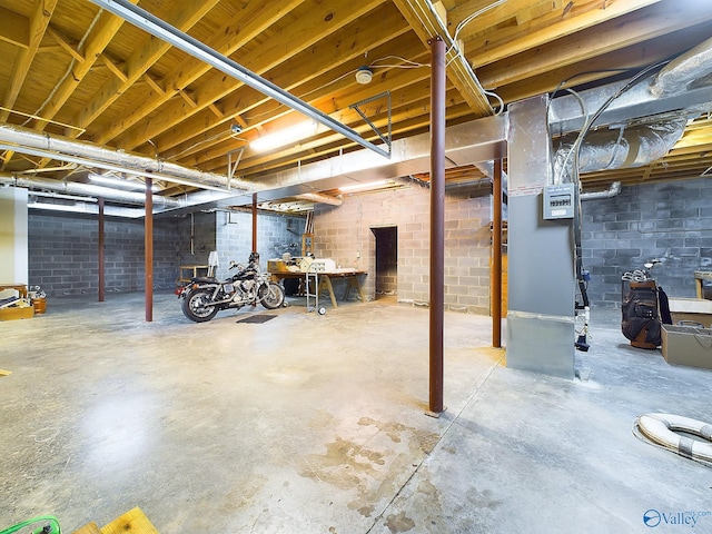 basement featuring heating unit