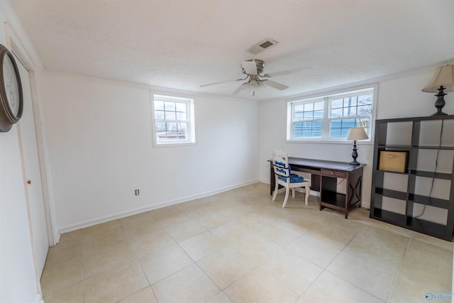 home office with baseboards, visible vents, a textured ceiling, and ornamental molding