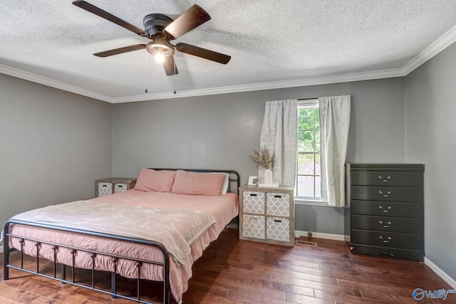 bedroom with wood-type flooring, a textured ceiling, crown molding, and ceiling fan