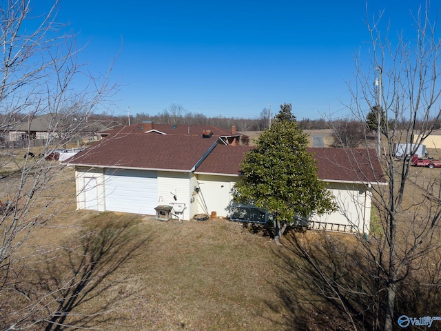 view of property exterior featuring a yard