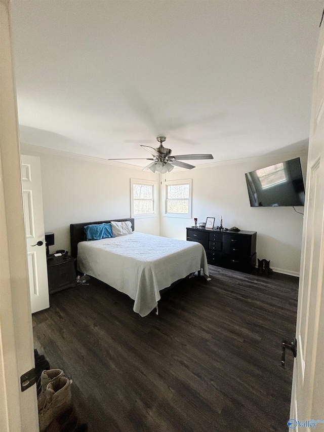 bedroom with dark wood finished floors and a ceiling fan