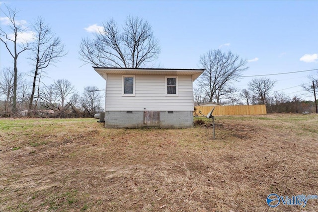 view of home's exterior with crawl space