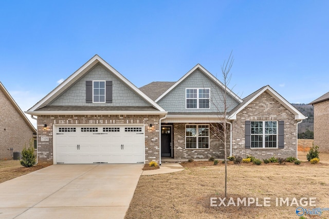 craftsman-style house featuring central air condition unit and a garage