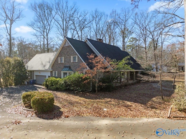 exterior space with a garage