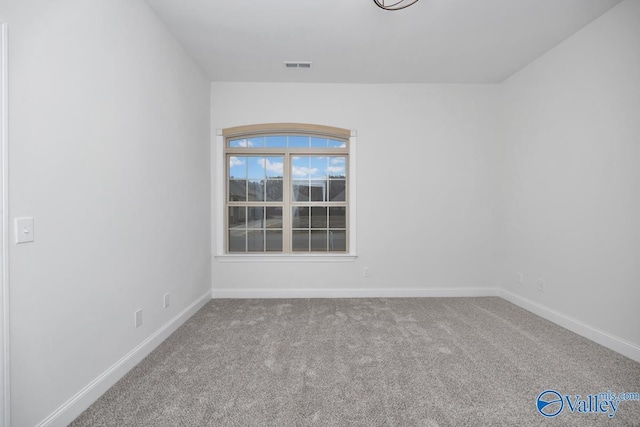 empty room with carpet floors