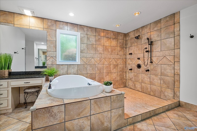 full bath featuring vanity, a tile shower, recessed lighting, and a garden tub