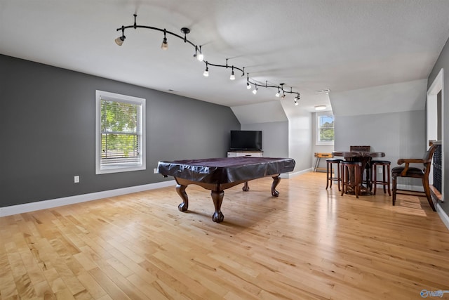 game room with rail lighting, billiards, baseboards, and light wood-type flooring