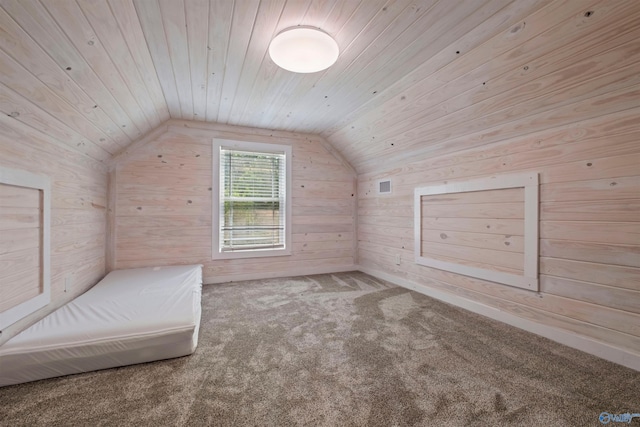 additional living space featuring carpet flooring, wooden walls, vaulted ceiling, and wooden ceiling