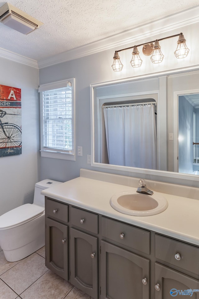 bathroom featuring crown molding, vanity, a textured ceiling, tile patterned flooring, and toilet