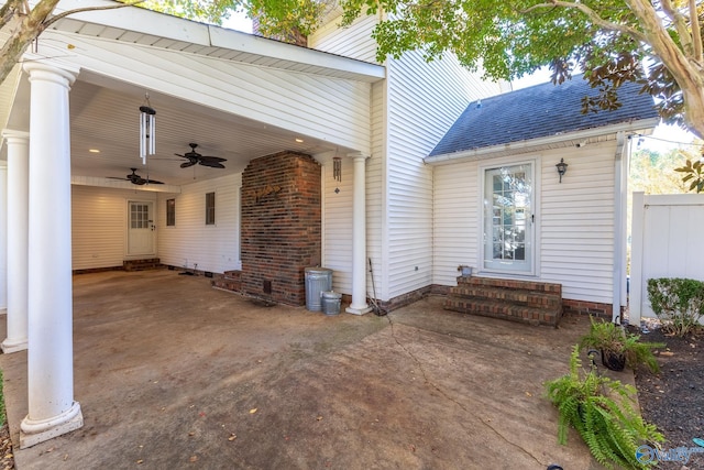 exterior space with ceiling fan and a patio area