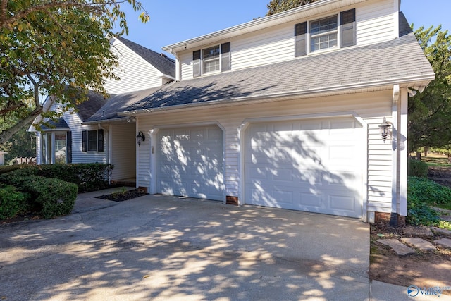 front of property featuring a garage