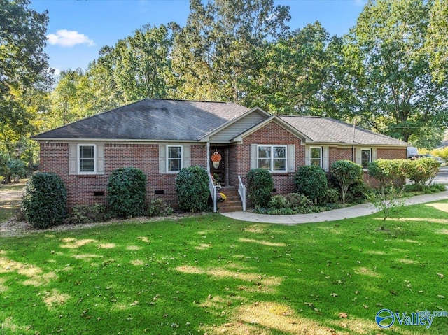 ranch-style house with a front lawn